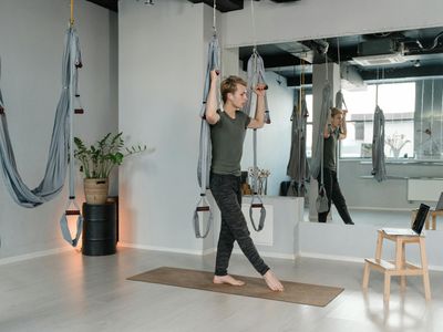 Freelancer practicing yoga at home studio
