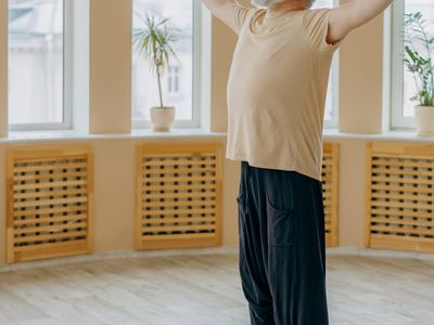 Senior person practicing gentle mobility movements